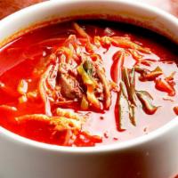Yukge Jang · Shredded beef, potato noodle and vegetable in chili beef broth.