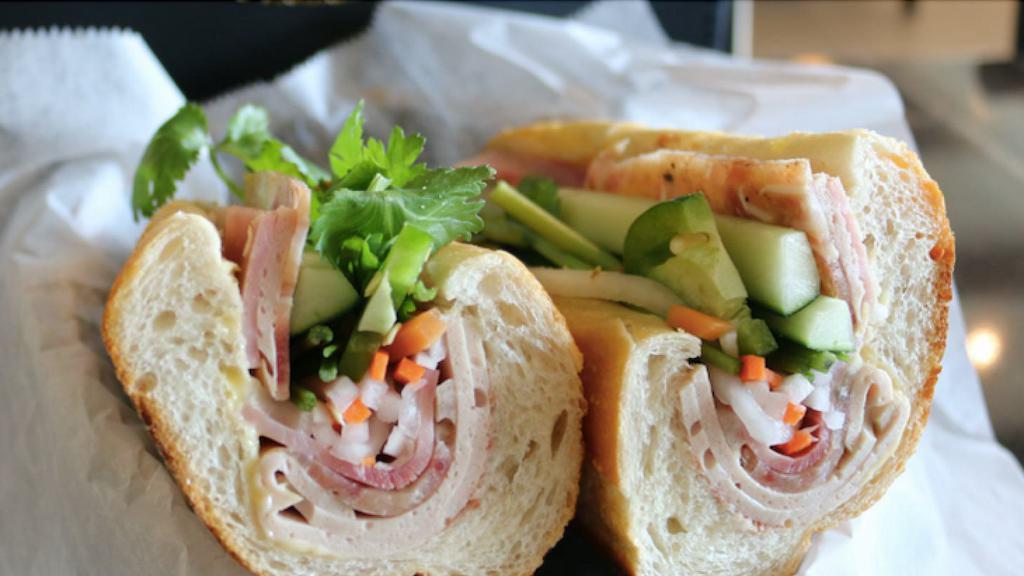 Bánh Mì Thịt Nguội · Mixed meat on baguette bread.