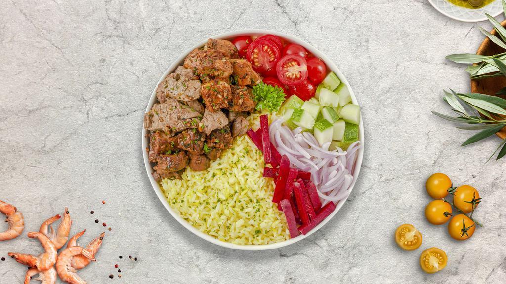 Chicken & Lamb Gyro On Rice · Thinly sliced pieces of chicken and lamb gyro meat marinated in a mediterranean blend of herbs and spices served on a sizzling bed of rice, lettuce on the side, and drizzled with our chef's exquisite white and red sauce.