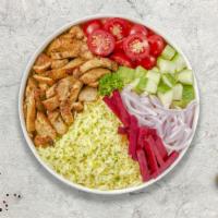 Chicken Gyro On Rice · Thinly sliced pieces of chicken marinated in a mediterranean blend of herbs and spices serve...