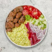 Lamb Gyro On Rice · Thinly sliced pieces of lamb gyro meat marinated in a mediterranean blend of herbs and spice...