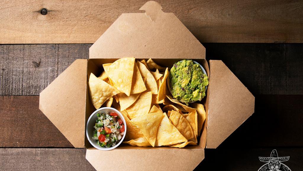 Chips & Salsa · Whole corned tortilla chips, served with our house made salsa.