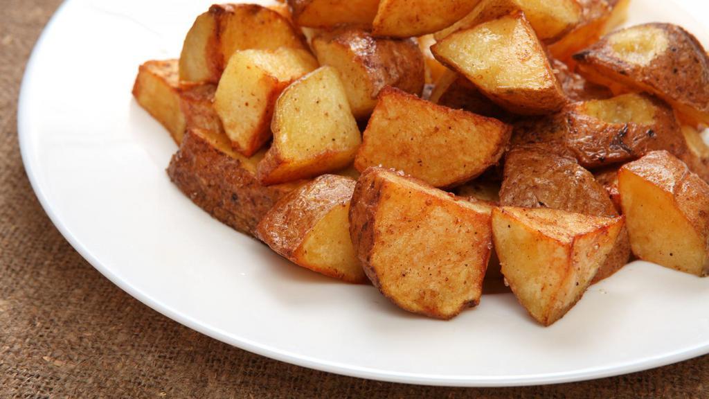 Home Fries · Cubed Potatoes fried and salted to perfection.