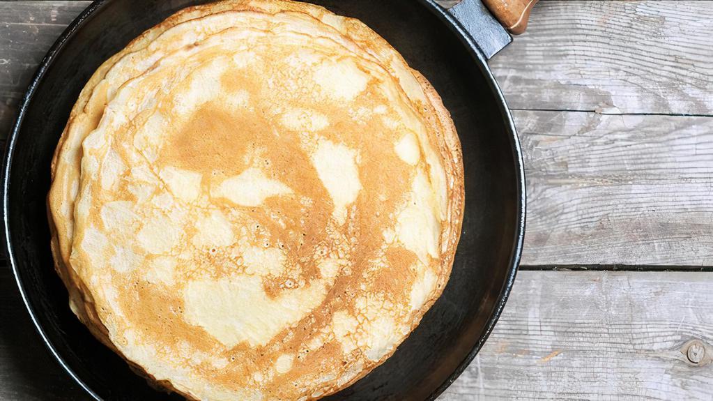 2 Pancakes · Fresh, fluffy pancakes.