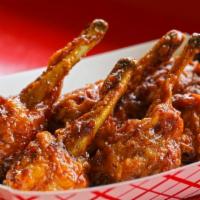 Lollipop Wings · Sritacha candied cashew drumsticks or sticky sesame wings Thai chilies
