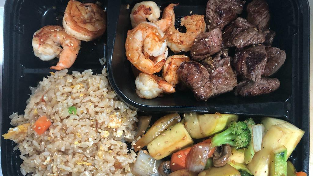 Hibachi Shrimp & Steak Combo · Most popular. New York sirloin with jumbo shrimp.  and served with soup or salad, vegetables, and fried rice or noodles.