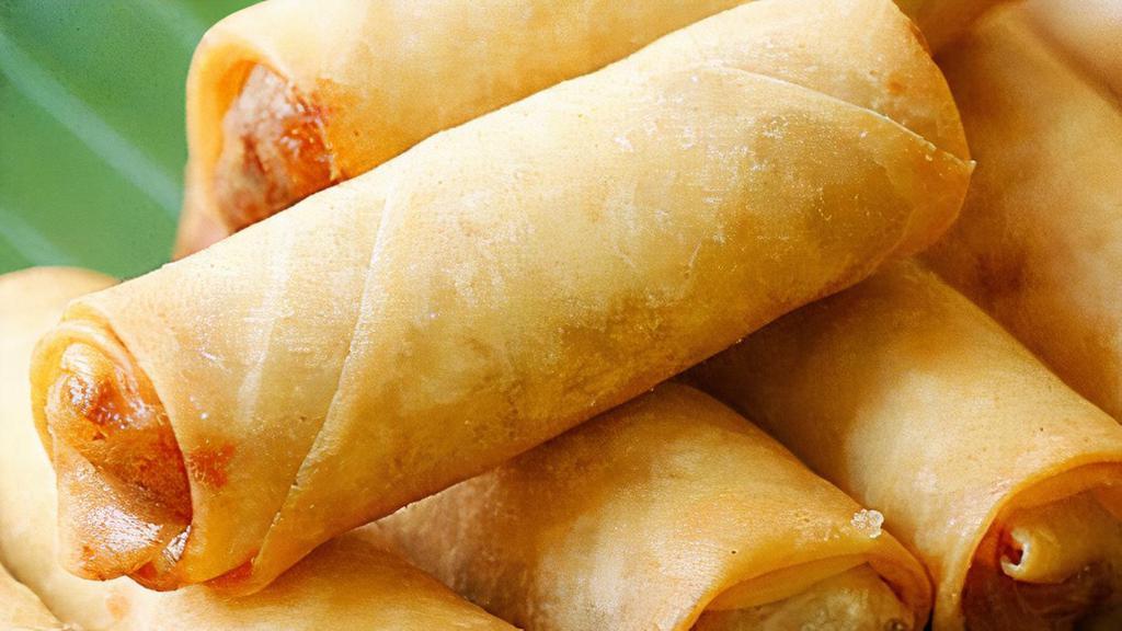 Spring Rolls (4Pcs) · Carrots, glass noodles, taro and cabbage wrapped in rice paper and served with plum sauce.