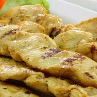 Chicken Satay (4Pcs) · Marinated chicken served on skewers with homemade peanut sauce and cucumber sauce.