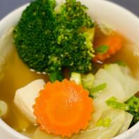 Vegetable & Tofu · Onions, carrots, broccoli, scallions and soft tofu in a clear broth.