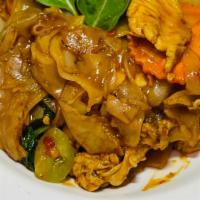Pad Kee Mow (Drunken Noodles) · Spicy. Stir-fried flat rice noodles, chili, bell peppers, carrots, basil, onions, and egg in...