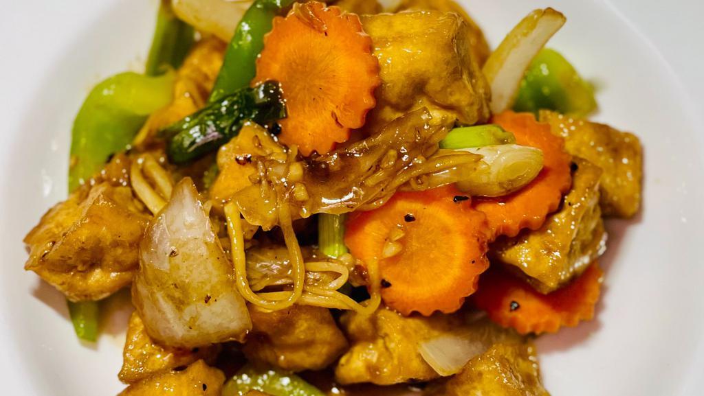 Ginger Sauce · Sautéed with fresh ginger, carrots, onions, scallions, and bell peppers in a brown sauce.