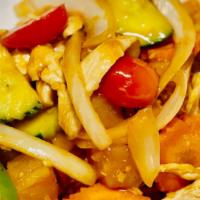 Sweet & Sour Sauce · Sautéed with tomatoes, onions, bell peppers, pineapple, cucumber and carrots in a sweet and ...