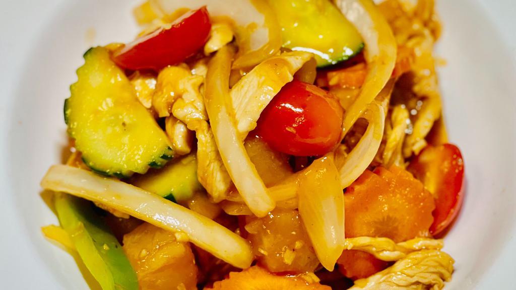Sweet & Sour Sauce · Sautéed with tomatoes, onions, bell peppers, pineapple, cucumber and carrots in a sweet and sour sauce.
