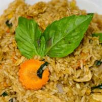 Basil Fried Rice · Spicy fried rice with chili peppers, basil, carrots, bell peppers, onions and egg