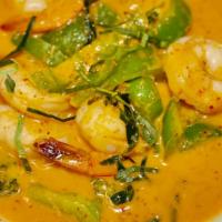 Panang Curry · Sweet and spicy curry paste, bell peppers, basil and broccoli in coconut milk.