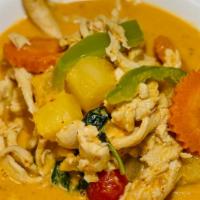 Pineapple Curry · Mildly spicy curry, bell peppers, carrots, tomatoes and pineapple in coconut milk.