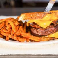 Seagull Burger · Grilled cheese sandwich on Texas toast with 1/2 burger topped with bacon, tomato & seagull's...