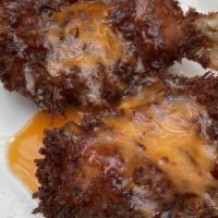 Coconut Shrimp · Served With Rum Chili Sauce