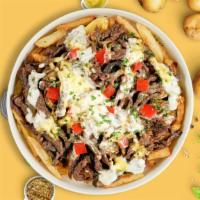 Really Philly Fries · Steak, caramelized onions, bell peppers, and melted cheese topped on Idaho potato fries.