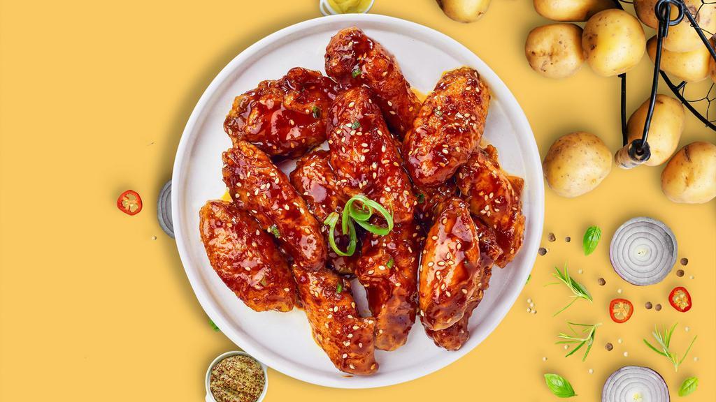Korean Klassic Wings · Fresh chicken wings breaded, fried until golden brown, and tossed in soy sauce, brown sugar, honey, and sesame seeds.