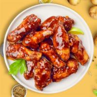 Bbq Business Wings · Fresh chicken wings breaded, fried until golden brown, and tossed in barbecue sauce. Served ...