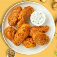 Hots For Habanero Wings · Fresh chicken wings breaded, fried until golden brown, and tossed in mango habanero sauce. S...