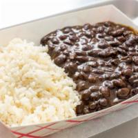 White Rice & Black Beans · Rice served with a side of black beans.