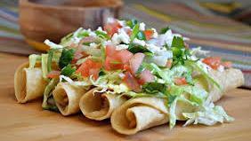 Chicken Flautas · Four pieces flautas with lettuce, tomato & cotija cheese topped with sour cream,side salsa