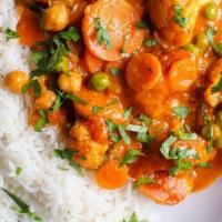 Vegetable Tikka Masala · Garden Fresh vegetables with onion, bell pepper cooked with fresh flavored herbs in creamy t...