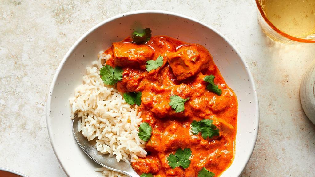 Tofu Tikka Masala · Broiled tofu cheese cubes with onion, bell pepper cooked with fresh flavored herbs in creamy tomato sauce. Served with a side of basmati rice.