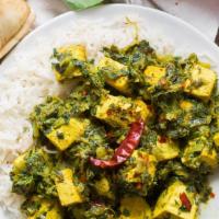 Tofu Saag · Tofu cubes cooked in creamy spinach sauce. Served with a side of basmati rice.