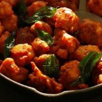 Gobi-65 · Crispy batter fried cauliflower florets sprinkled with south Indian spices.