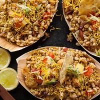 Bhel Puri · Mix of puffed rice, onion, sev, sweet and spicy sauce.