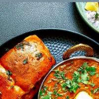 Pav Bhaji · Mashed potato and vegetable curry served with grilled buttered bread.