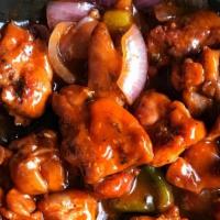 Chili Garlic Chicken · Boneless chicken stir fried with onions and bell pepper in indo-chinese sauce.