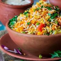 Veg · Fresh vegetable and special basmati rice flavored with authentic spices and cooked on slow f...