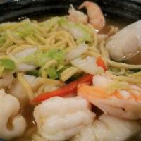 Asian Sf Noodle Soup · Egg noodle, jumbo shrimp, fresh scallop, squid, fish cake, shanghai green, and seafood broth.