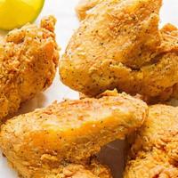 Fried Chicken Wings (4) · 4 pieces. cooked wing of a chicken coated in sauce or seasoning.