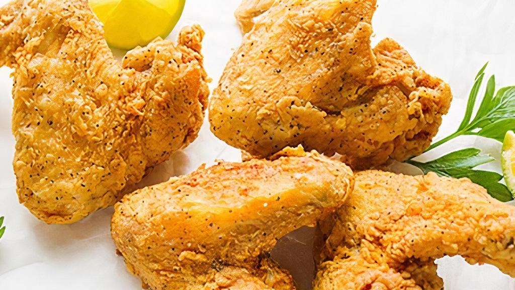 Fried Chicken Wings (4) · 4 pieces. cooked wing of a chicken coated in sauce or seasoning.