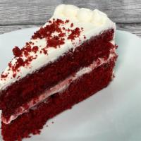 Red Velvet Cake Slice · Red velvet cake with cream cheese frosting.