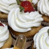 Tres Leches Cupcake · Light, airy cupcake filled with 3 decadent and creamy milks, topped with fluffy homemade whi...