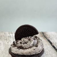 Oreo Cupcake · Chocolate cupcake topped with homemade cookies & cream icing, topped with Oreo crumble. & co...