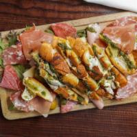 Charcuterie Board · Assorted cured Italian meats and cheese with our garlic pesto bread