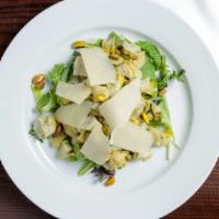 Artichoke And Avacado · artichokes and avocado tossed in lemon and oil topped with pistachios and shaved parmesan ch...