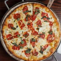 Margherita Pizza · tomato, mozzarella, basil