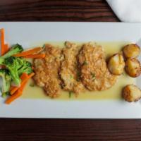 Veal Francese · battered and sautéed in a lemon white wine sauce