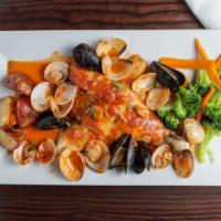 Branzino Marechiaro · european bass accompanied by mussels, and clams, in light tomato sauce