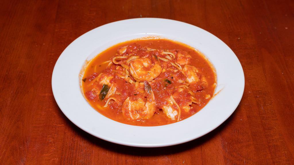 Gamberoni Fra Diavolo · Shrimp in a spicy marinara sauce over linguini.