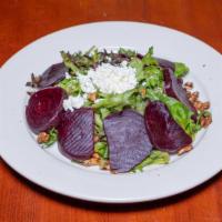 Beet Salad · Beets, mixed greens, goat cheese, caramelized walnuts, balsamic vinaigrette.