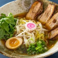 Shoyu Ramen · Pork or chicken chashu with marinated egg, bok choy, scallions, and bean sprouts.